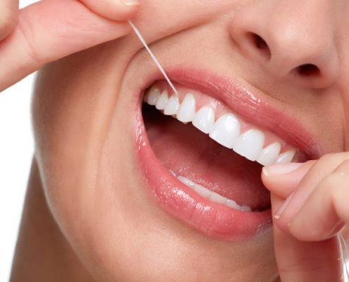 Should You Floss Before or After Brushing?